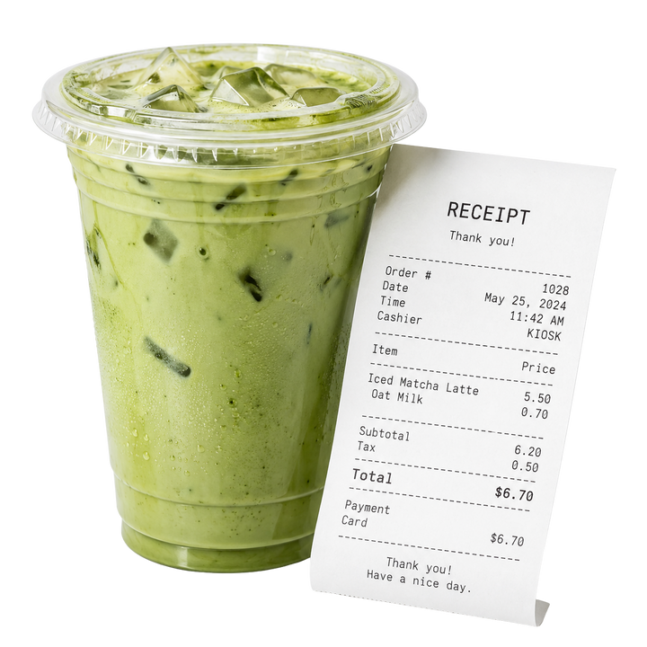 Cafe matcha latte beside a receipt