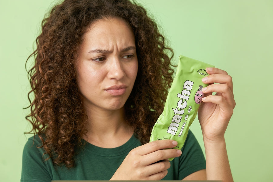 Customer examining a Poda matcha paste tube