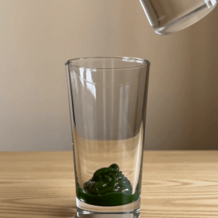 stir matcha with warm water