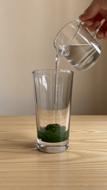 stir matcha with warm water