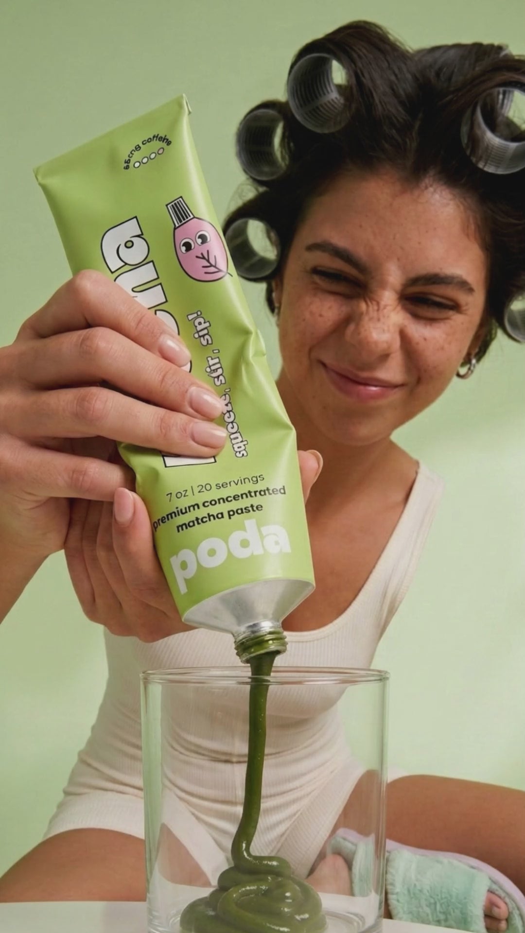 Making Poda matcha by squeezing matcha paste into a glass