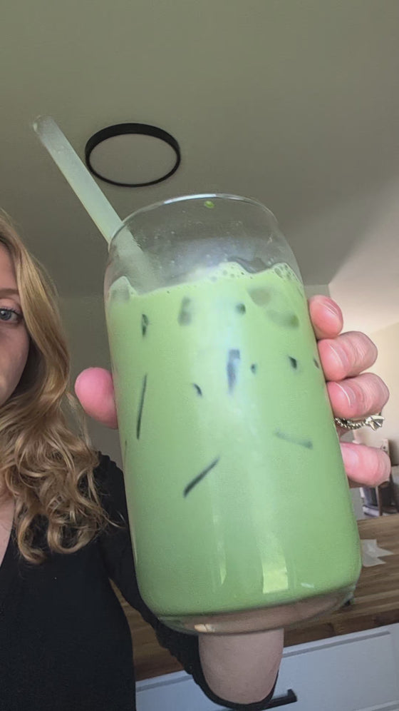 Customer showing a homemade iced Poda matcha latte