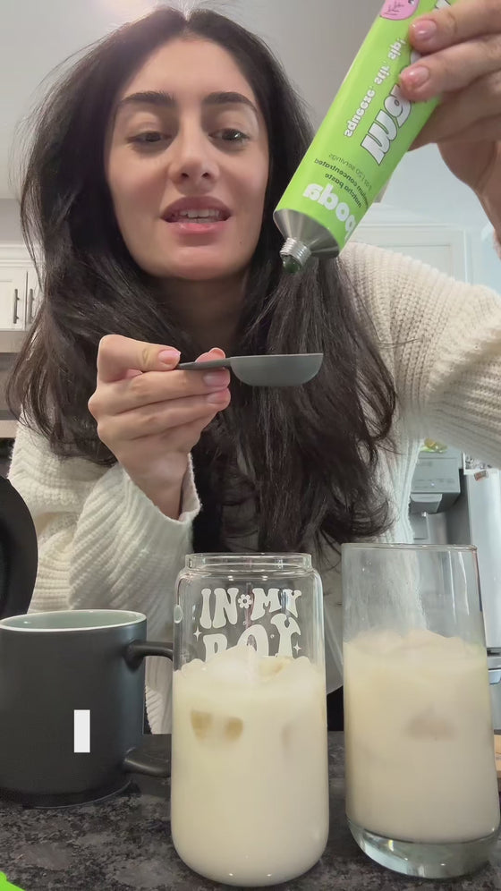 Customer squeezing Poda matcha paste onto a spoon