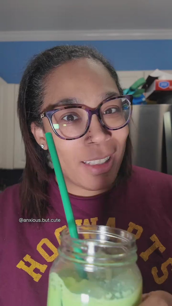 Customer reviewing a Poda matcha latte at home